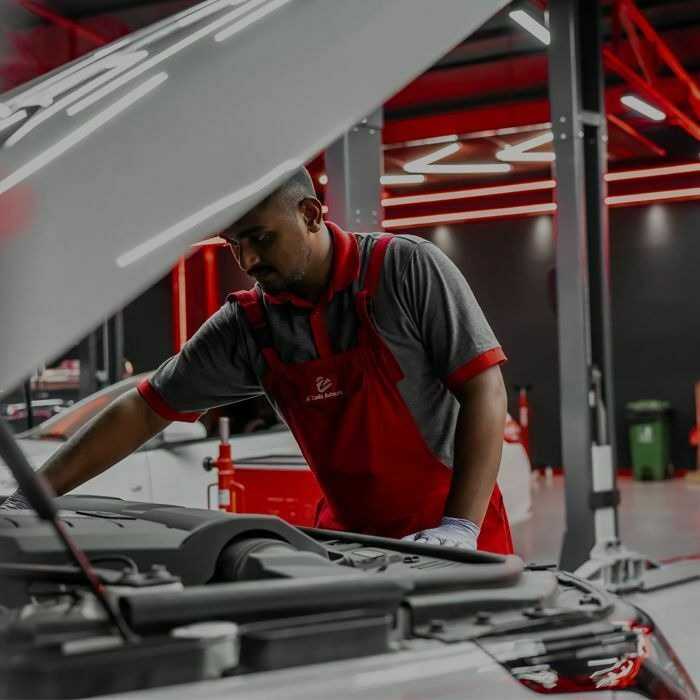 A technician working in the service bay